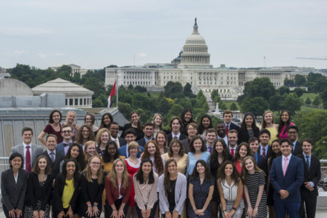 The 51 Representatives or Free Spirits pose on their last full day together on the top of the Newseum. Eric Tyulyandin stands in second bottom row, second from the right. Photo courtesy of The Newseum