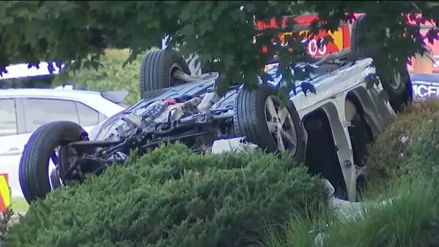 A damaged white Kia after a Maryland crash that killed one man and injured seven children